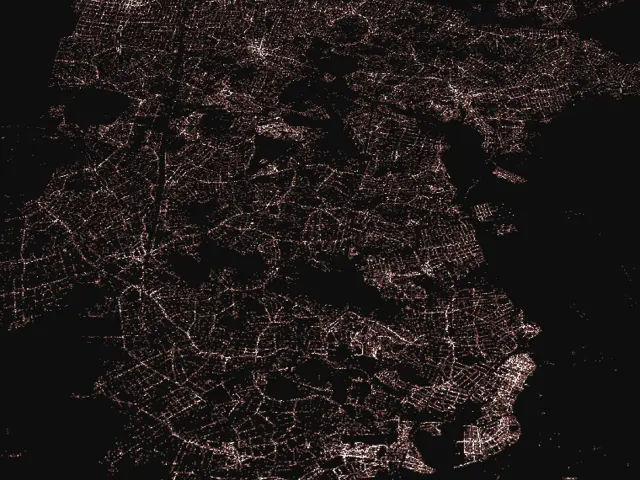 Mapa escuro do estado do Rio de Janeiro formado por milhões de pontos luminosos, cada um representando um CNPJ ativo